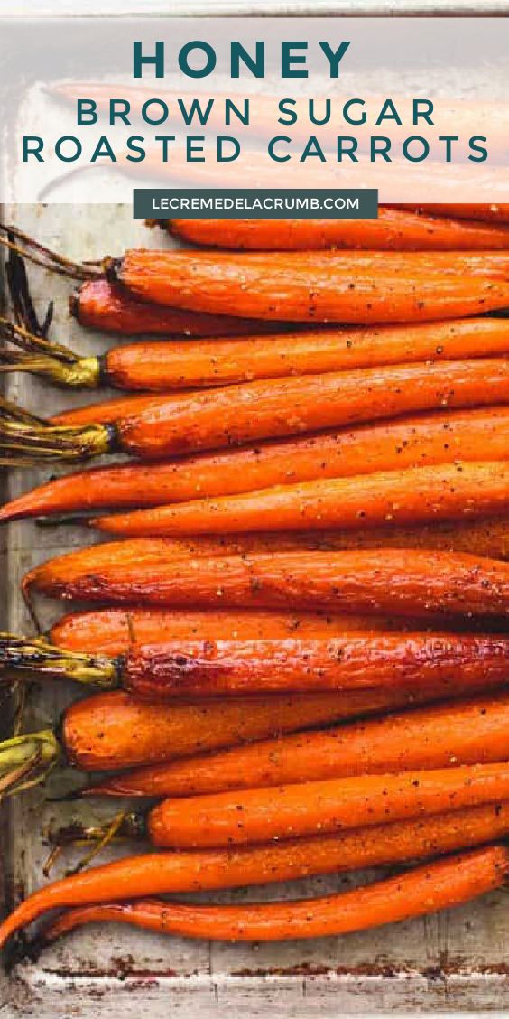 honey brown sugar roasted carrots in a baking pan with text overlay that reads honey brown sugar roasted carrots