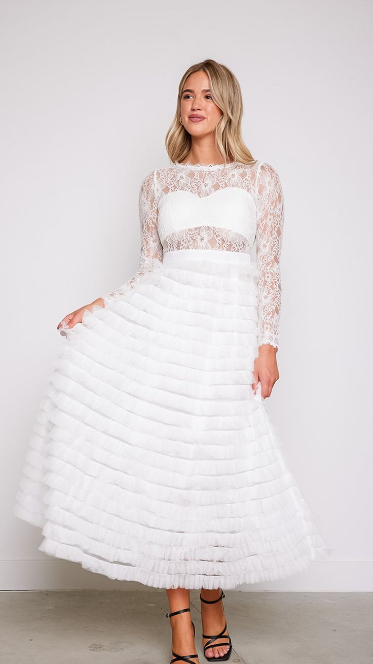 Experience the magic and allure of our Olivia Layered White Lace Tulle Dress, where timeless elegance meets modern romance. Whether you're walking down the aisle, attending a formal event, or celebrating a special occasion, this dress will make you feel like the epitome of grace and beauty. 78747 D8-2 Lace Layered Dress, Lace Tulle Dress, Lace Layers, Layered Dress, Modern Romance, Layer Dress, Walking Down The Aisle, Resort Style, Floral Dress Black