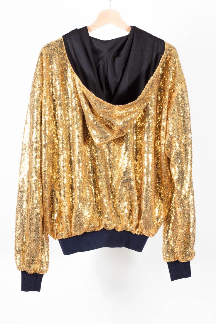 Gorgeous Gold Rush Bomber Jacket. Handmade in limited quantity, this jacket is beautifully made, with the shiniest of gold sequin material, hooded, with quality cuffs and lining. A firm favourite, and perfect for the festive season! Available in S 8-10-12 UK Size, L 14-16-18 Winter Glitter Long Sleeve Outerwear, Trendy Hooded Outerwear For Party, Winter Tops With Contrast Sequin, Winter Contrast Sequin Tops, Gold Sequined Outerwear For Winter, Long Sleeve Sequined Outerwear For Festivals, Boho Girl Style, Gold Sequin Jacket, Sequin Outfits