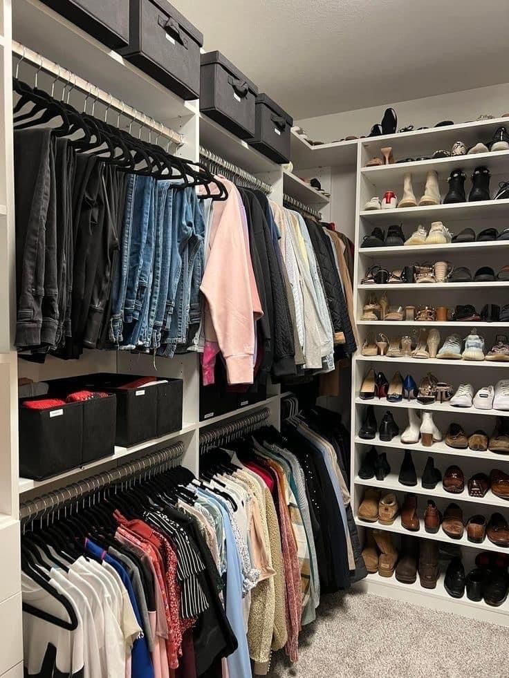 a closet filled with lots of clothes and shoes