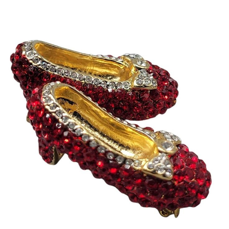 Ruby Red Shoes Brooch Sparkle Rhinestone High Heel Dorothy Wizard of Oz Slippers

This Ruby Red Shoes Brooch is an exquisite representation of Dorothy's iconic shoes from Wizard of Oz. Sparkling with rhinestones, this high heel brooch offers a touch of whimsical charm.

• Ruby red rhinestone brooch
• High heel slipper design
• Inspired by Wizard of Oz
• Adds whimsical charm

Condition: Pre-Owned Good

In excellent condition

#WizardofOzbrooch #Dorothy'sredshoes #Highheelbrooch #Rhinestoneslipperpin #Rubyredsparkle Dorothy Wizard Of Oz, Slipper Design, Iconic Shoes, Rhinestone High Heels, High Heel Slippers, Designer Slippers, Red Rhinestone, Rhinestone Brooches, Wizard Of Oz