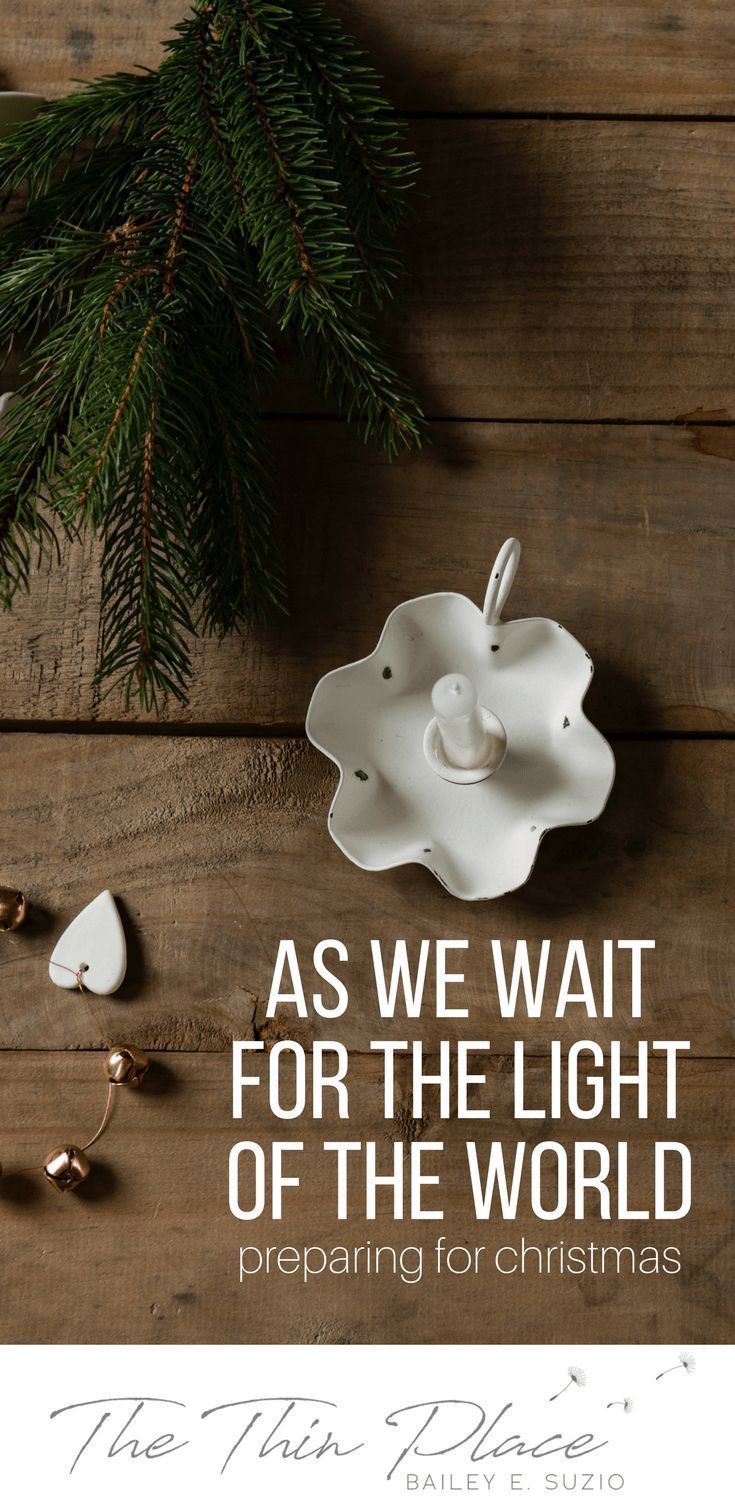 a christmas card with the words as we wait for the light of the world, preparing for christmas