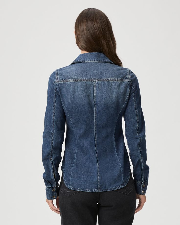 Devika is the classic denim shirt you’ll be reaching for all season long. Crafted from supremely soft denim in a vintage dark blue wash, this lightweight layer is designed with western flare seaming, elevated snap buttons, and double chest pockets. | Devika Shirt - Belinda Blue | Size Small