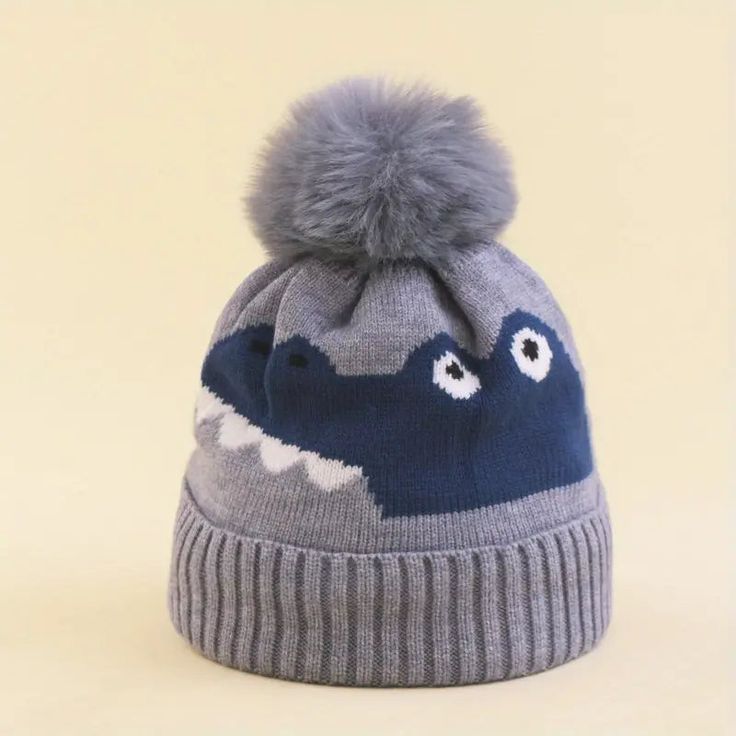 Kids Winter Hat | Croc - Kids Accessories - Poshinate Kiddos Baby & Kids Store - Front view of Croc hat Winter Sports Hats With Fleece Lining, Warm Hat For Winter Sports, Warm Hats For Winter Outdoor Activities, Warm Winter Hat For Outdoor Activities, Insulated Hats For Winter Sports, Blue Winter Outdoor Hat, Fun Winter Beanie Hat, Winter Cap With Plush Lining, Fun Winter Hat, One Size Fits Most