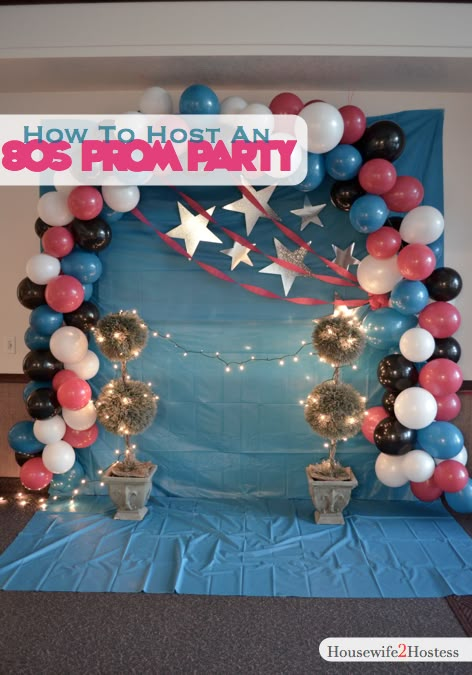 an arch made out of balloons and streamers with the words how to throw a 90's prom party