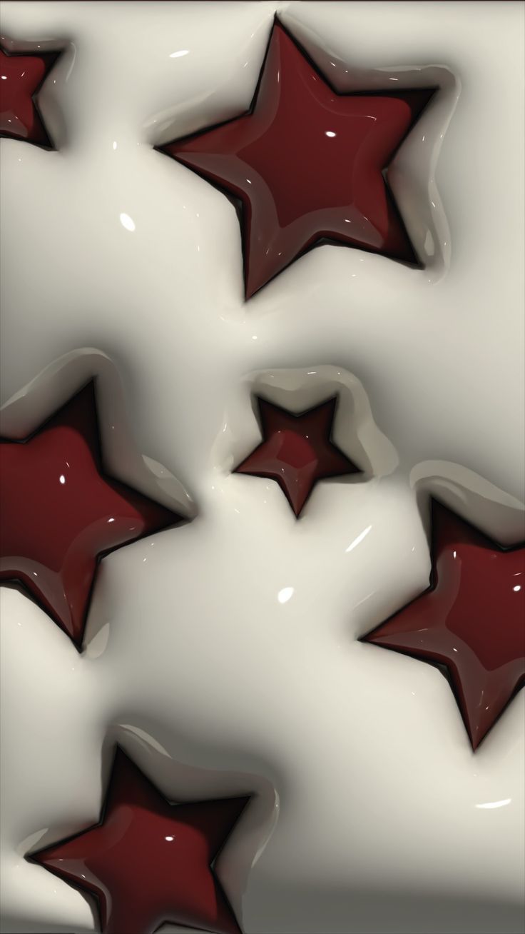 red and white stars are in the middle of some liquid