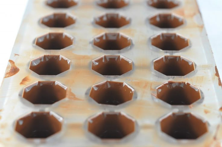 there are many chocolates in the tray ready to be made into desserts or cupcakes