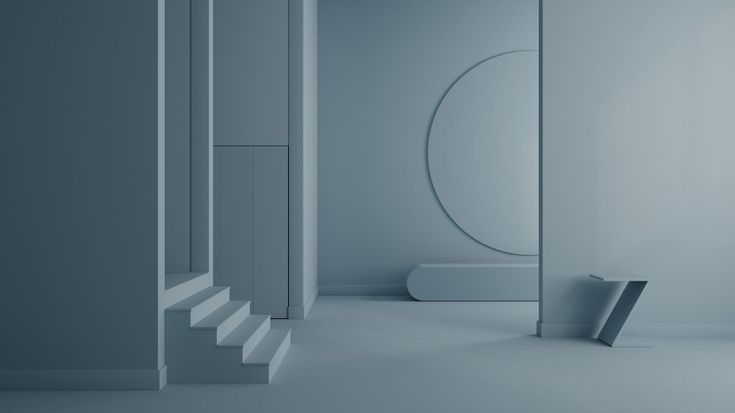 an empty room with white walls and stairs