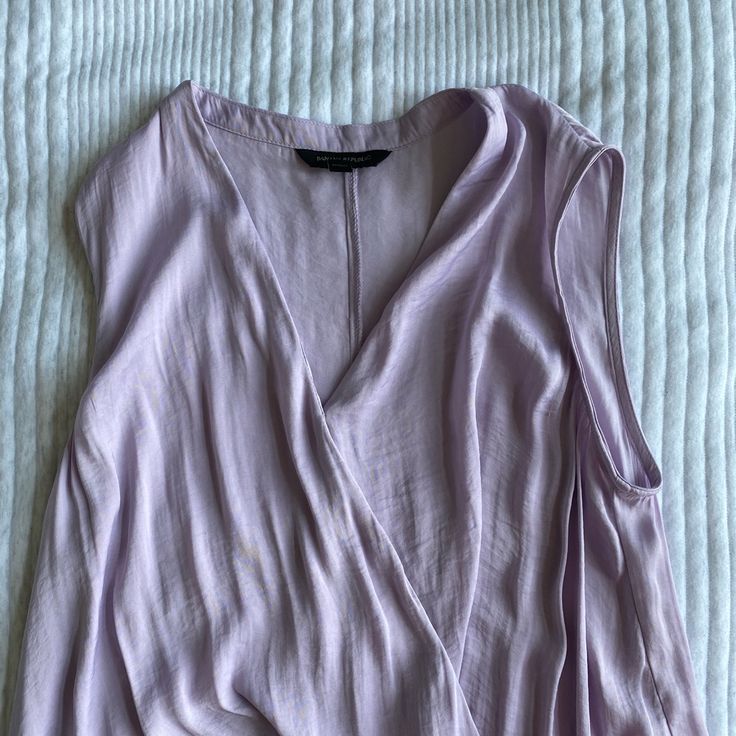 The Pictures Don’t Do The Color Justice! It’s An Amethyst Lavender. Truly Gorgeous And Lovely Flowy Silky Material Never Worn But No Tags. Size Small! Purple V-neck Blouse For Day Out, Lavender V-neck Summer Blouse, Chic Mauve V-neck Top, Chic Purple V-neck Top, Chic Pink Viscose Top, Feminine Purple Workwear Top, Feminine Purple Top For Workwear, Feminine Purple Tops For Workwear, Elegant Lavender Tops For Spring