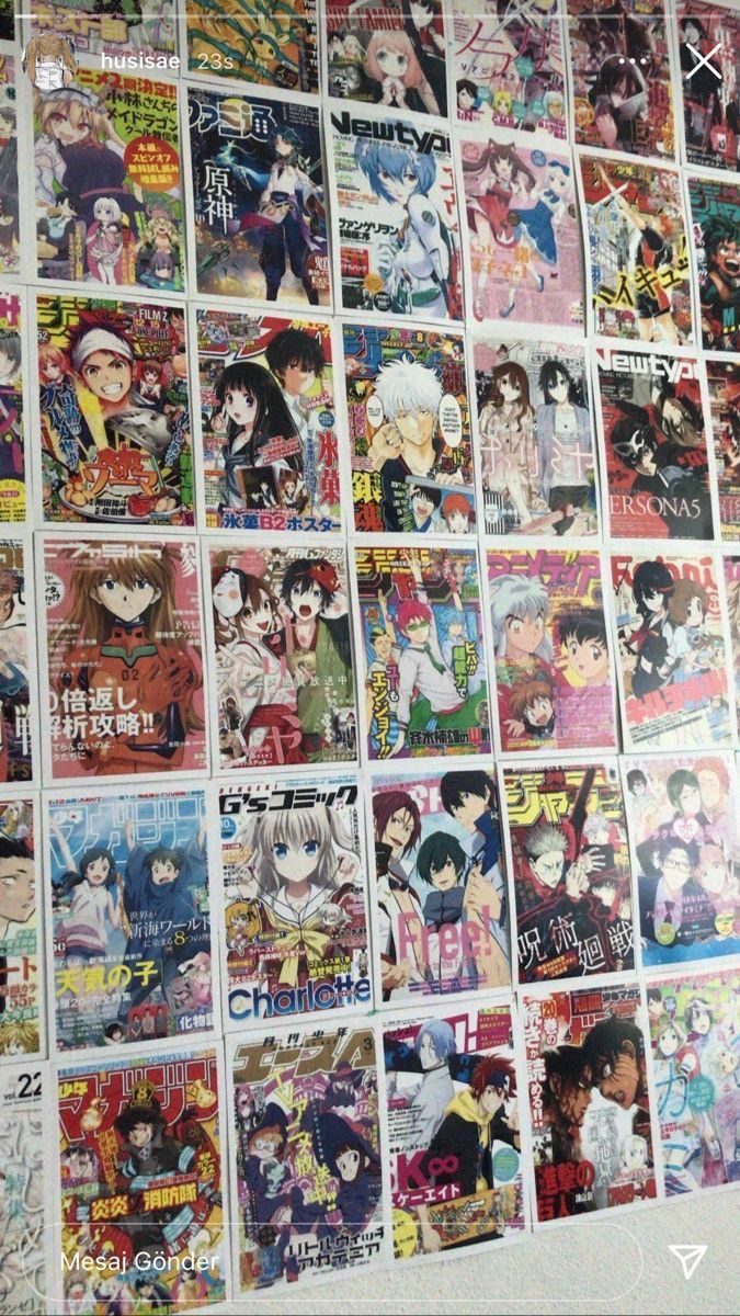 a bunch of anime posters are on the wall