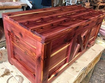 a large wooden box sitting on top of a table