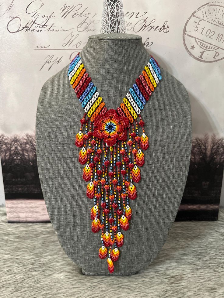 All our pieces are genuine.Each chaquira is handcrafted by artisans from the most representative areas of Huichol art. Faux Fur Handbag, Huichol Art, Bib Necklaces, Necklace Earrings, Bracelet Set, Etsy Accessories, Jewelry Necklaces, Accessory Gift, Pet Supplies