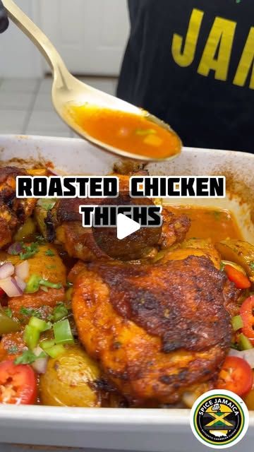 a person holding a spoon in a casserole filled with chicken and veggies