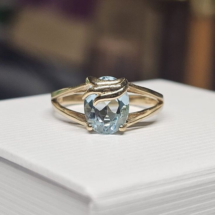 a ring that is sitting on top of a book