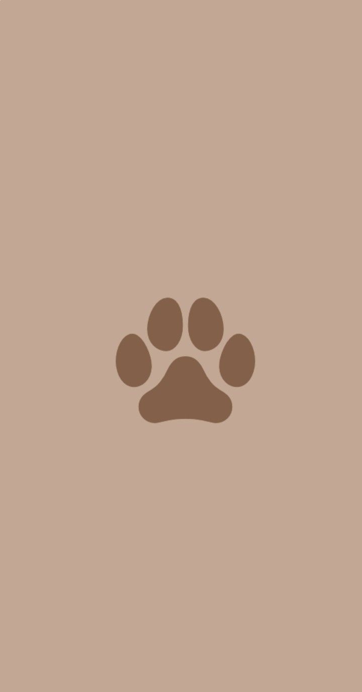 an animal's paw print on a tan background