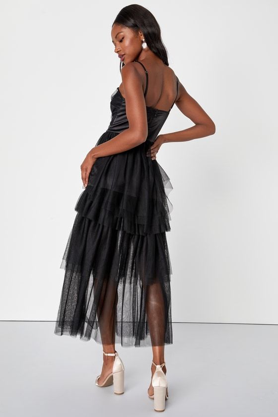 Bring a flirtatious flair to any event with the Lulus Sultry Sweetness Black Tiered Tulle Maxi Dress! Airy woven tulle shapes this breathtaking dress that has adjustable spaghetti straps and a darted bodice with a straight neckline and a banded satin waist. Skirt has tiers of lightweight tulle that falls to a sheer maxi hem. Hidden zipper/clasp at back. Fit: This garment fits true to size. Length: Ankle length. Size medium measures 45.50" from adjustable straps to hem. Bust: Great for any cup si Sheer Tulle Mesh Dress With Sweetheart Neckline, Fitted Organza Midi Dress For Evening, Sheer Tulle Mesh Dress For Gala, Tulle Mesh Dress With Sweetheart Neckline For Cocktail, Cocktail Mesh Dress With Sweetheart Neckline In Tulle, Cocktail Tulle Mesh Dress With Sweetheart Neckline, Fitted Tulle Mesh Dress For Prom, Sheer Tulle Glamorous Evening Dress, Glamorous Sheer Tulle Evening Dress