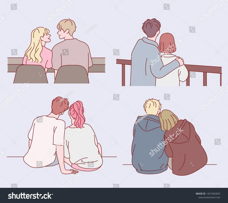 four people sitting at a table with their backs to each other