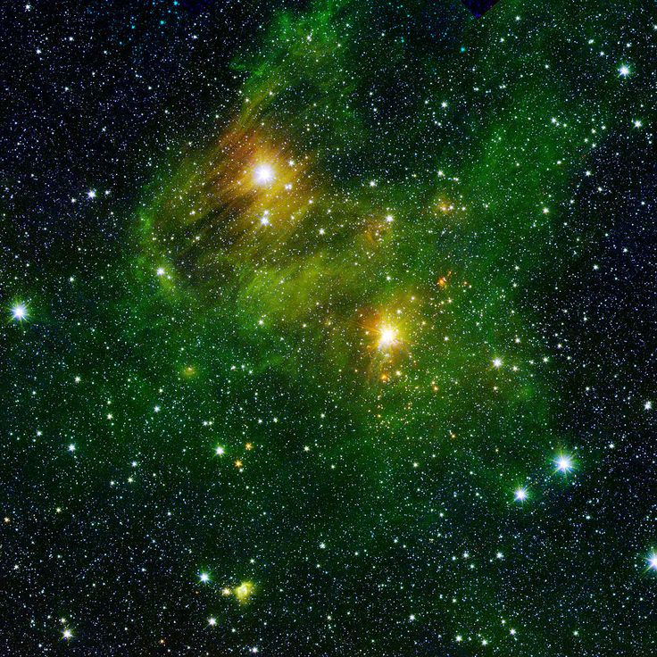 an image of a green and yellow star cluster in the sky with stars all around it