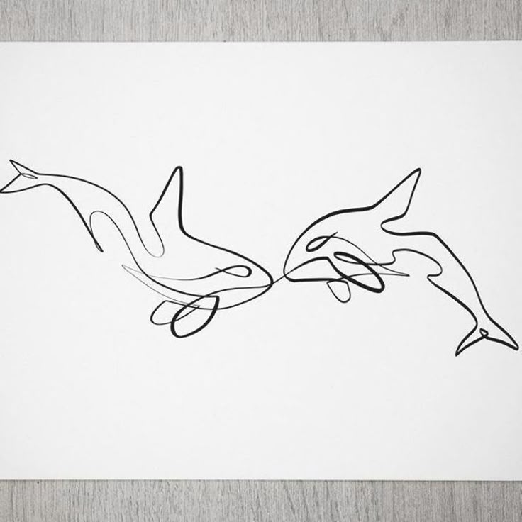 a drawing of two dolphins swimming in the water with their tails touching each other's heads