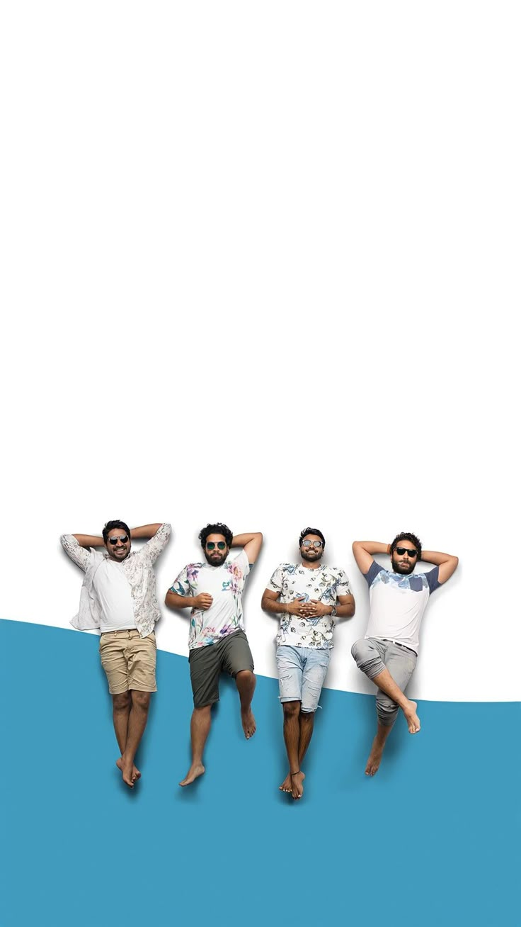 three men are laying down in front of a blue and white background with the same image on it