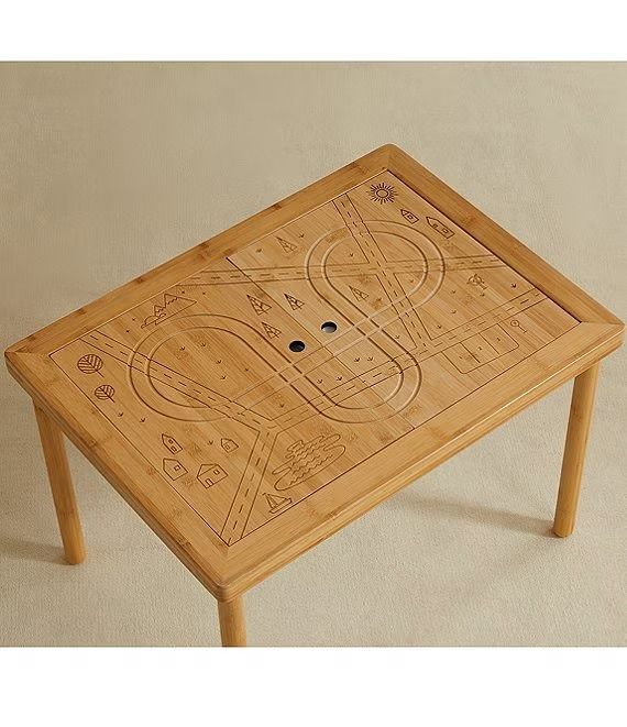 a wooden table with a board game on it's top and two holes in the middle