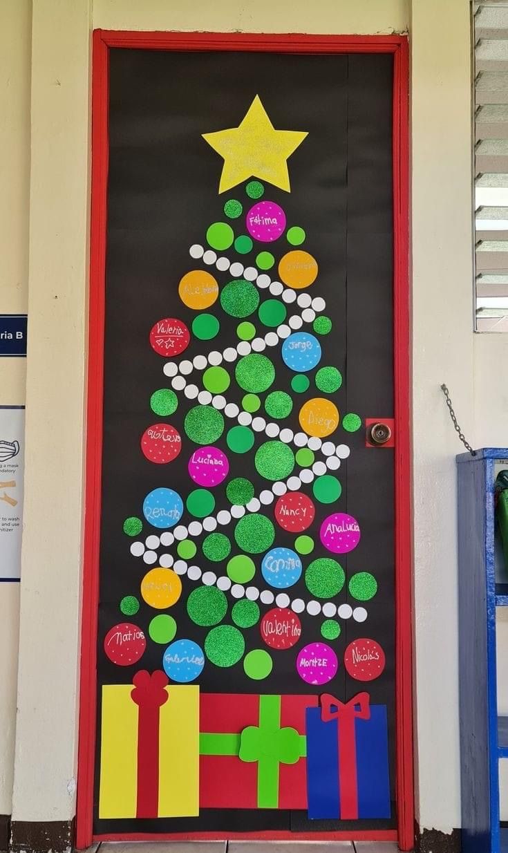 a decorated door with a christmas tree on it