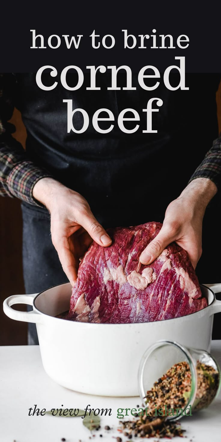 a person holding a piece of meat in a pot with the words how to brine corned beef