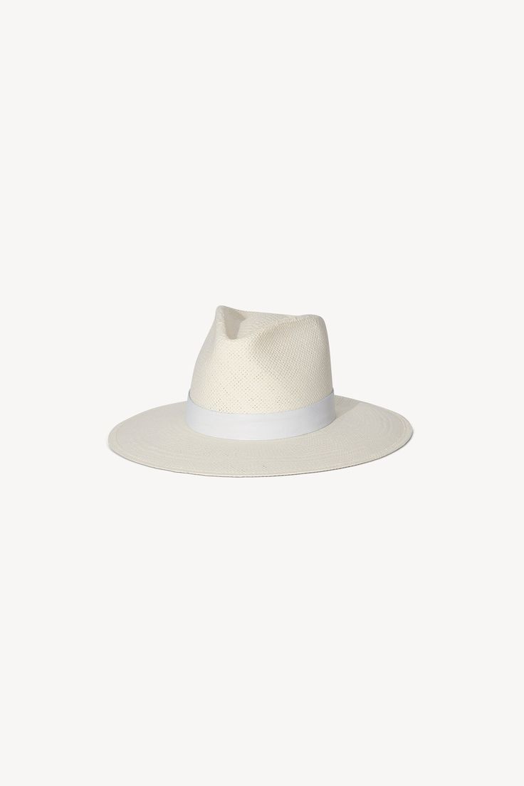 A classic fedora style made with packable straw. The structured fit creates a beautiful modern shape while staying true to the timeless design of our classic fedora. | Spring Summer 2021 Collection by Janessa Leoné. Clothing Must Haves, Women Fedora, Packable Hat, Lounge Sweater, Janessa Leone, Easy Tiger, Surf Shop, South Of France, Leather Band