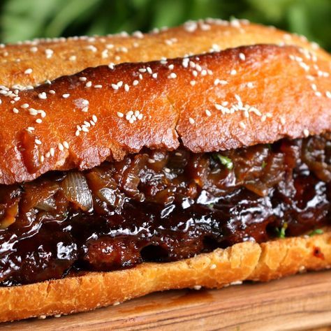 a close up of a sandwich on a cutting board