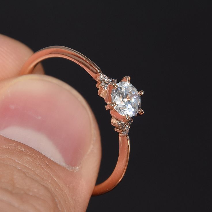 "Rose gold ring, Women engagement ring, Rose gold engagement ring, Promise ring, Minimalist ring, Small ring, Tiny ring, Delicate ring WE OFFER UNLIMITED PERIOD INSTALLMENTS PLAN This is a beautiful, stunning, feminine ring that works well for all occasions, styles, and ages. You will love it! Ring information: Main stone: White cubic zirconia Approximate size: 5mm Accent stones: Cubic zirconia Metal type: Gold Metal stamp: 14k Gold Customization / Replacements It's easy to create jewelry that's 14k Rose Gold Stackable Promise Rings, Rose Gold Brilliant Cut Ring For Wedding Proposal, Rose Gold Brilliant Cut Ring For Proposal, Dainty Round Cut Ring For Proposal, Minimalist Brilliant Cut Ring For Proposal, Rose Gold Open Ring For Promise, Delicate Solitaire Ring For Proposal, Promise Ring In Rose Gold With Single Diamond, Rose Gold Promise Ring With Single Diamond