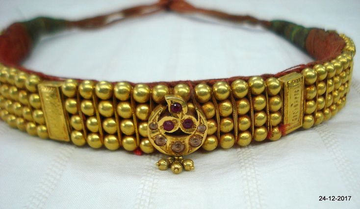 Vintage antique tribal old 22kt gold beads choker necklace from rajasthan India. Great design good for jewelry collection. Note - Gold beads are filled with wax. Please check pictures carefully for more detail. Groos weight - 73.5 grams Net gold weight approx - 24 grams Gold beads length - 26.7 cm (10.5 inches) Gold beads width - 2 cm (0.8 inches) Length free size can be adjsut by back thread knot. Traditional Adjustable Gold Kundan Necklace, Traditional Gold Kundan Necklace For Navratri, Heavy Temple Jewelry Choker For Rituals, Ceremonial Temple Jewelry Choker Necklace, Traditional Gold Kundan Necklace For Puja, Intricate Design Choker For Festivals, Festive Brass Choker For Festivals, Heavy Temple Jewelry Choker For Ceremonial Occasions, Traditional Antique Gold Temple Necklace For Festive Season