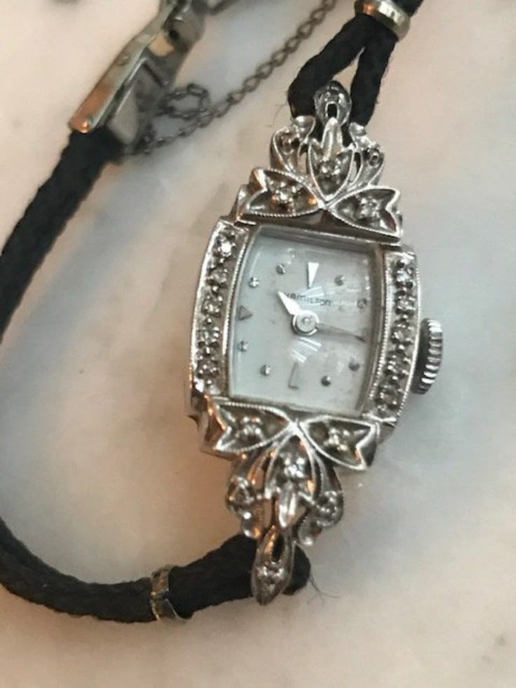 Antique Platinum Evening Watches, Art Deco Platinum Diamond Jewelry, Art Deco Platinum Jewelry With Diamond Hour Markers, Art Deco Platinum Diamond-studded Jewelry, Elegant White Gold Collectible Watches, Classic Diamond Watch Hallmarked, Art Deco White Gold Diamond Jewelry And Watches, Elegant Collectible White Gold Watches, Silver Jewelry And Watches With Diamond Accents For Wedding