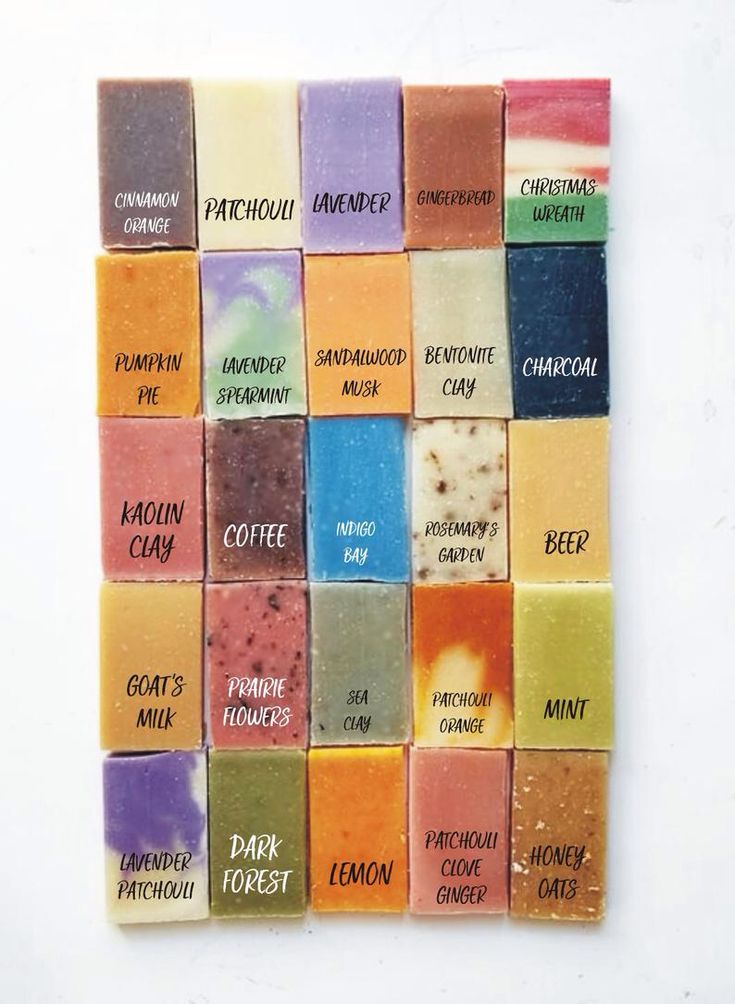 soap bars with different flavors on them are arranged in a square pattern, each containing the names of different types of soaps