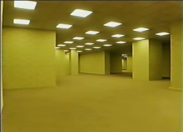 an empty room with lights on the ceiling and no one in it or someone else