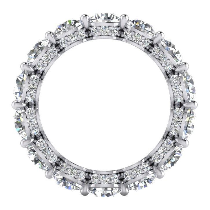 an oval shaped diamond ring with rows of round diamonds in the middle, surrounded by smaller stones