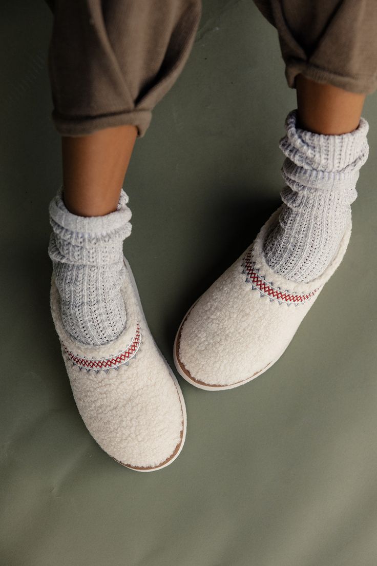 The Fireside Sherpa Slippers are your new Winter companion. Featuring sherpa material and a slight platform, you can say hello to relaxation with ease! manmade materials if in between sizes, size up White Slippers With Textured Sole And Round Toe, Cozy Slippers With Cushioned Footbed And Round Toe, Cozy Synthetic Slippers With Round Toe, White Slippers With Textured Footbed, Comfy White Slippers With Textured Footbed, Fall Slippers With Textured Footbed And Round Toe, Winter Cream Closed Toe Slippers, Cream Round Toe Indoor Slippers, White Synthetic Winter Slippers