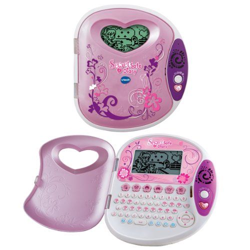 a pink and white electronic toy with hearts on it's display case next to a purple heart shaped object