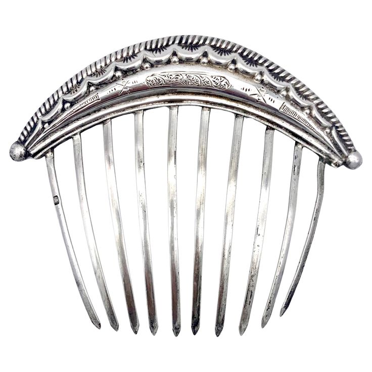 This hair comb was handcrafted in the 1840's, the engraving in the centre is typical for the design of the second half of Louis Philippe. The design of this hair comb features a grooved edged terminating in half balls on either side. Underneath the outer ornament we see an engraved garland motif decreasing in size towards the edges. under the garland motif we see a repetition of the ball motif, also decreasing in sizer towards the edges. This silver comb is marked with the head of minerva accomp French Hair Comb, 19th Century Hair, Antique Hair Combs, Snake Hair, Silver Hair Comb, Wedding Comb, Silver Head Piece, Vintage Hair Combs, Hair Adornments