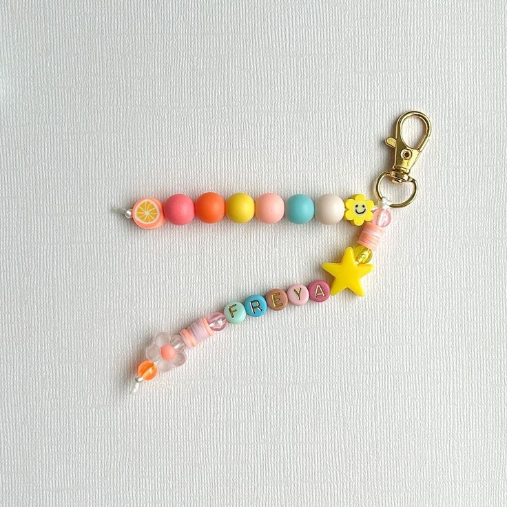 a keychain that has some beads on it