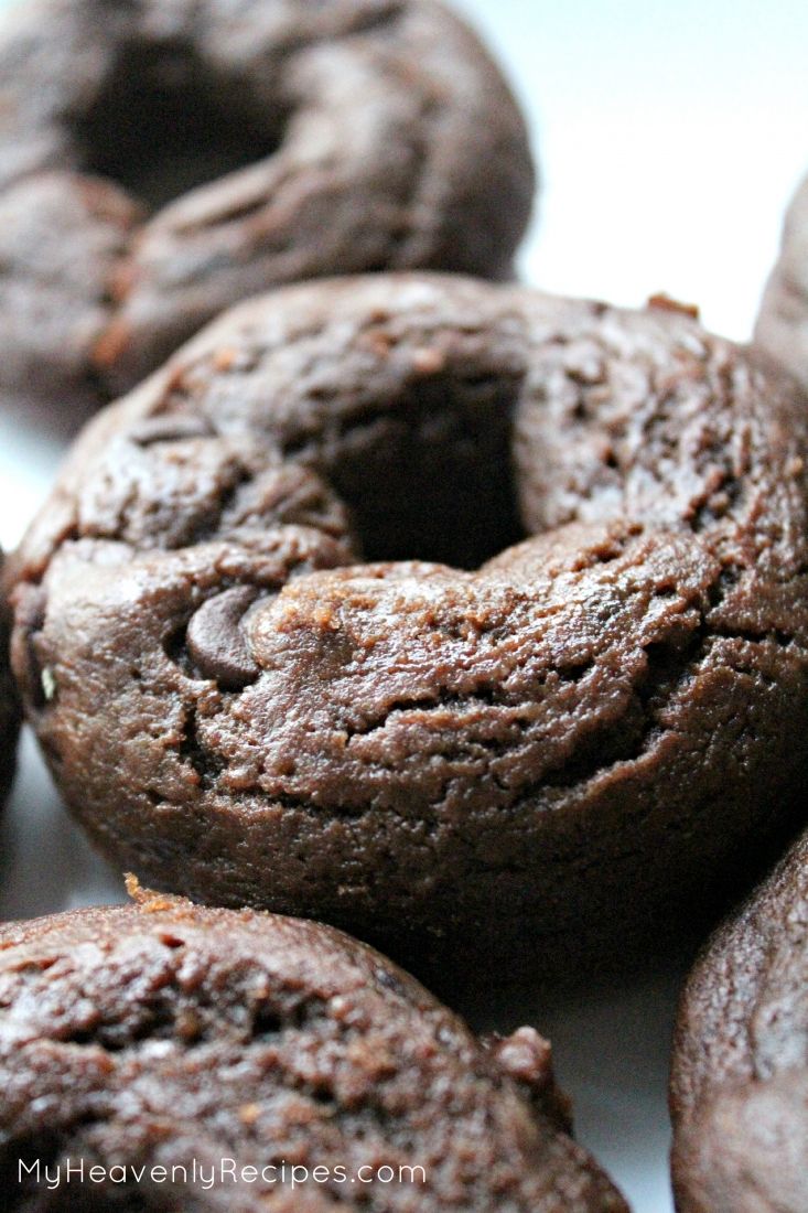 chocolate donuts stacked on top of each other with the words baked chocolate donuts above them