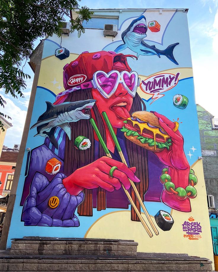 a large mural on the side of a building