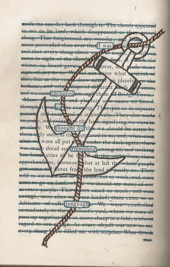 an old book with a drawing of a cross and anchor on the page in it