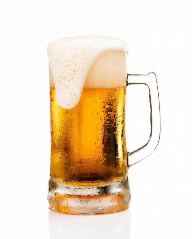 a glass of beer with foamy bubbles