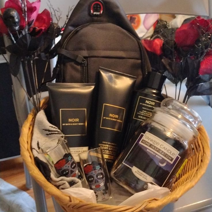 a basket filled with personal care items on top of a table next to a vase