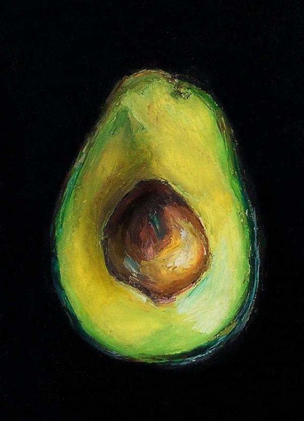 an avocado is shown on a black background with green and yellow highlights in the center