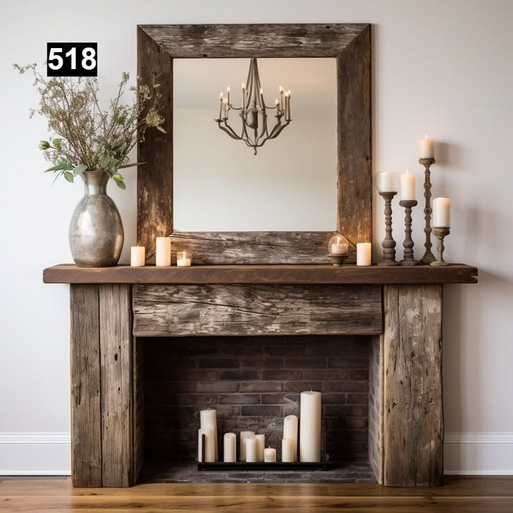 a fireplace with candles and a mirror above it