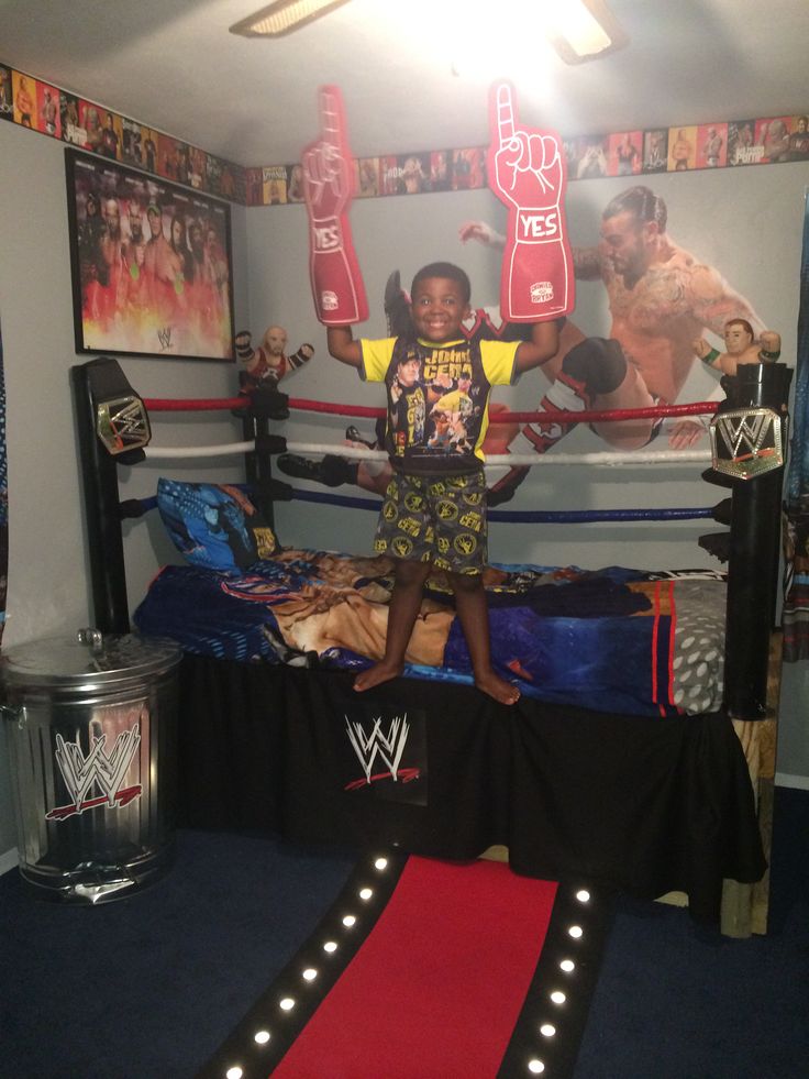 WWE Custom Bedroom - love the idea of decorating a steel bin to look like a hardcore weapon Wrestling Theme Bedroom, Wwe Room Ideas Bedroom, Wrestling Bedroom Ideas, Wrestling Ring Bed, Wwe Bedroom Decor, Wwe Bedroom Ideas, Wwe Decorations, Wwe Bedroom, Diy Boy Bedroom