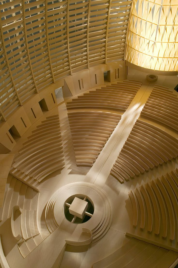 the inside of a building with wooden slats