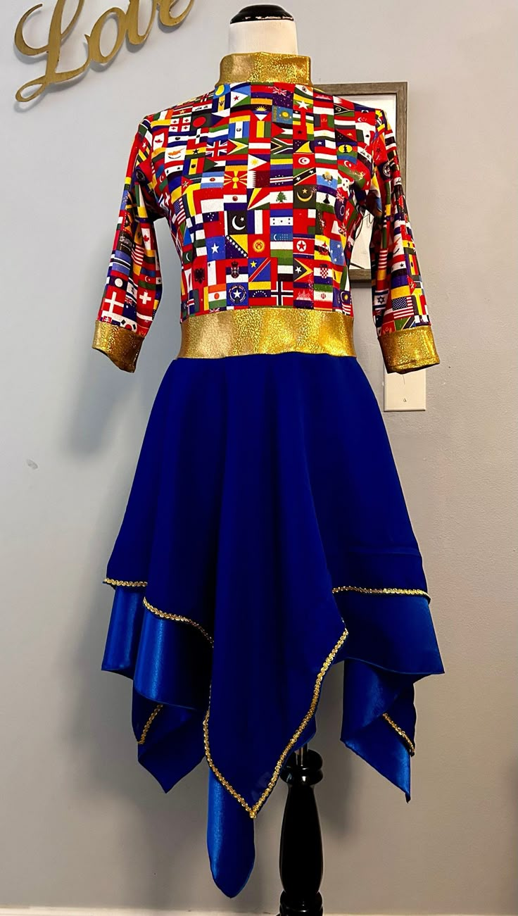 Beautiful prophetic dress with 3/4 sleeves (long sleeves upon request), with different nations flags print in spandex fabric. Bottom is chiffon and satin fabrics with gold trimming in top skirt.  Sizes run like your regular clothes size. Color is royal blue with print but if you would like a custom color with your nations print, message us and we'll let you know available colors. Liturgical Dance Garments, Praise Dance Outfits, Worship Dance Outfits, Praise Dance Garments, Praise Dance Wear, Dance Worship, Praise Dance Dresses, Liturgical Dance, Dance Garments