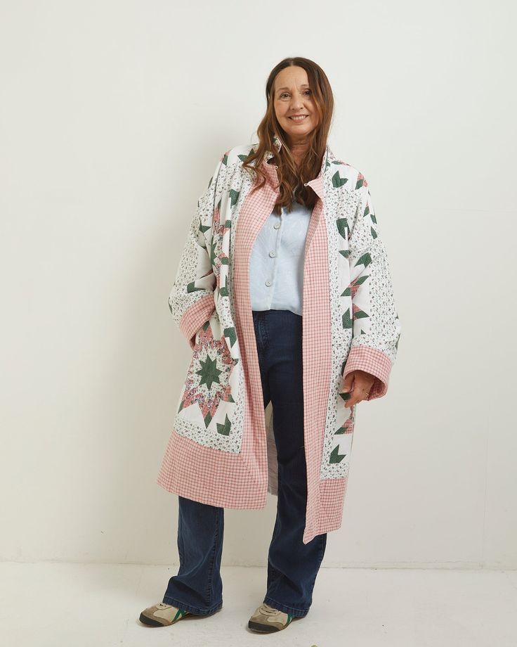 This captivating long wrap coat is more than just an outer layer – it's a statement piece steeped in sustainable style. Crafted from 100% cotton vintage fabric, expertly upcycled and given a new lease on life, this coat boasts a rich history and unique character. The long, wrap silhouette flatters any figure, while the self-tie belt cinches your waist for a defined look. Deep pockets add functionality without compromising the flowy drape. Perfect for those breezy spring days, this coat offers effortless elegance with a touch of vintage charm. Designed for an easy, oversized relaxed fit. Would fit size: 16 - 18 - 20 Measurements : Armpit- armpit 74cm, Nape of neck to bottom hem 106cm, Neck - rolled cuff 65cm Materials: 100% up-cycled vintage quilted patchwork cotton. Trees planted: 37 in yo Fall Cotton Outerwear For Daywear, Winter Cotton Outerwear With Shawl Collar, Oversized Long Cotton Outerwear, Oversized Long Sleeve Winter Robe, Winter Long Sleeve Relaxed Fit Robe, Cotton Long-sleeve Outerwear For Daywear, Long Sleeve Relaxed Fit Robe For Fall, Cotton Long Sleeve Outerwear For Daywear, White Cotton Outerwear For Daywear